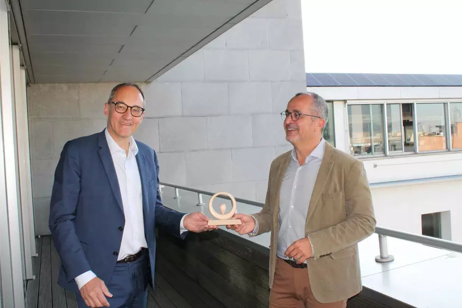Nicolas Germond geeft de fakkel door aan Franck Arlen